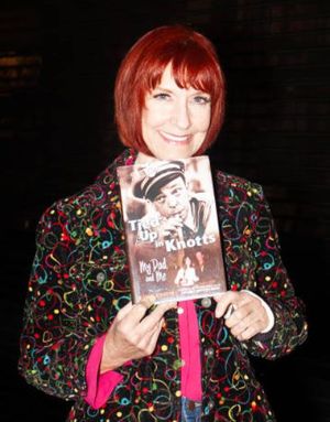 Karen Knotts poses with her book "Tied up in Knotts".