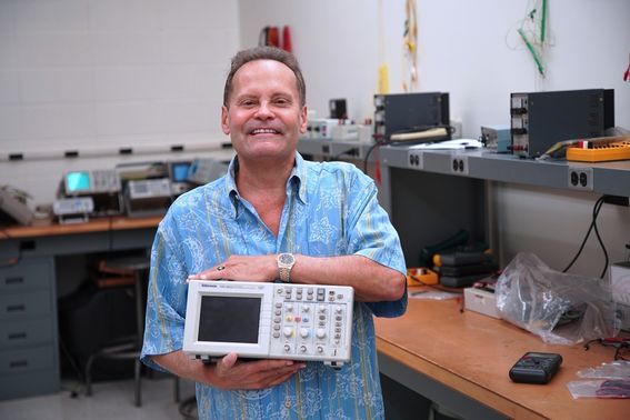 Michael “Puff” Prendergast, Class of 1983, came back to WVU Potomac State College this fall to donate a Tektronix Oscilloscope to the Engineering Department.  An oscilloscope is a laboratory instrument commonly used to display and analyze the waveform of 