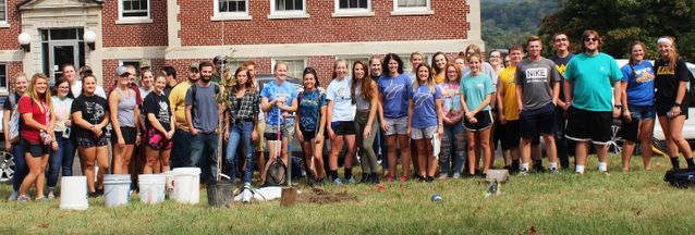 Approximately 40 West Virginia University Potomac State College students volunteered to help plant trees on campus earlier this month. The College received a Carla Hardy WV Project CommuniTree grant from Cacapon Institute to plant 24 trees around the Admi