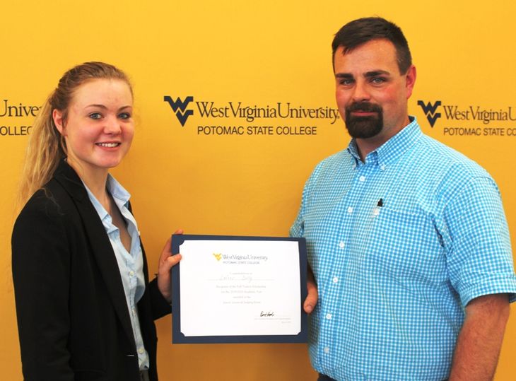 Laicey Dolly, from Mineral County, was named the senior with the highest overall score which earned her a tuition waiver to WVU Potomac State College her freshman year. Presenting her with her certificate was Equine Studies Instructor Jared Miller.