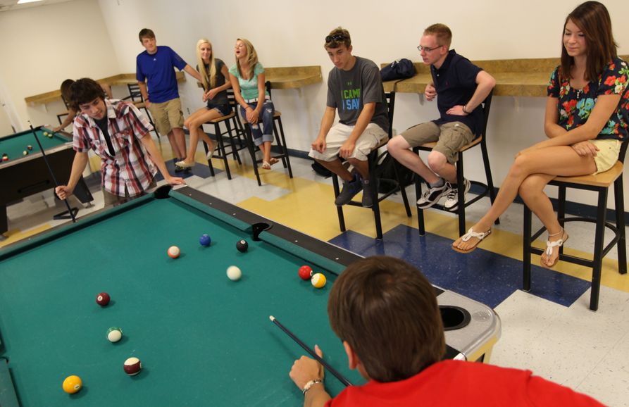 Students playing billiards at The Underground at WVU Potomac State College