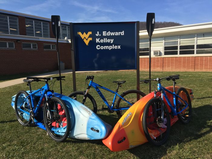 Bicycles and Kayaks, that can be rented, sitting outside of the J. Edward Kelley Complex at WVU Potomac State College