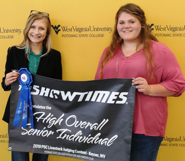 Katie Miltenberger, a member of the Mineral County FFA Senior Team, was named High Overall Senior Individual. Making the presentation was WVU Potomac State College Student Maggie Waugh, a sophomore Agriculture and Environmental Education major, who also s