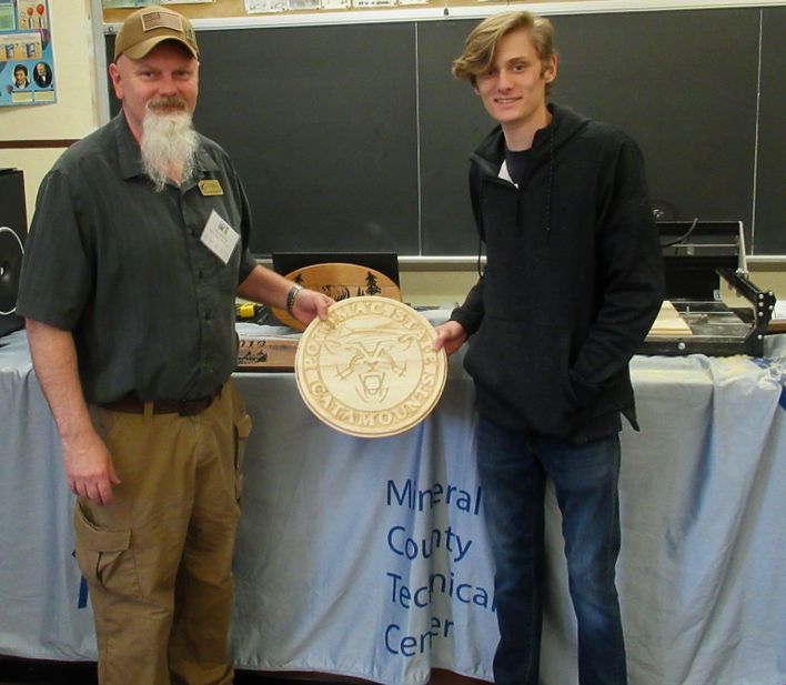 Caption: Jim Spurling, left,  and Dillion Young presented about manufacturing processes at the 2019 Mineral County STEM Festival. This year, Spurling will present, “Additive and Subtractive Manufacturing Processes” with a demonstration using 3D printing a