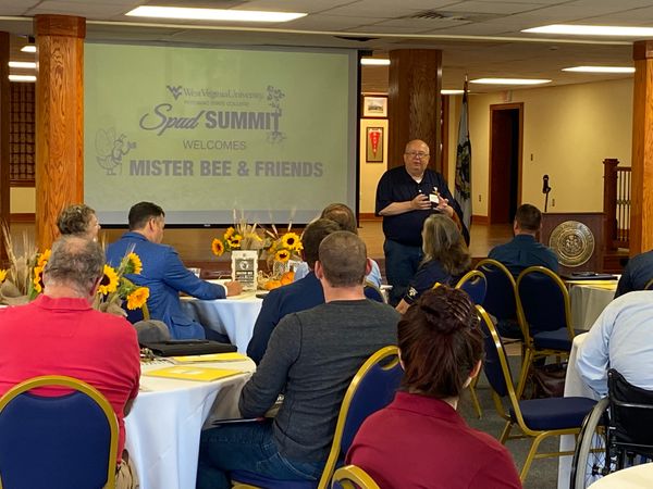 WVU Potomac State College Interim President Chris Gilmer introduces the order of the day during the college’s first West Virginia Spud Summit on Thursday morning.